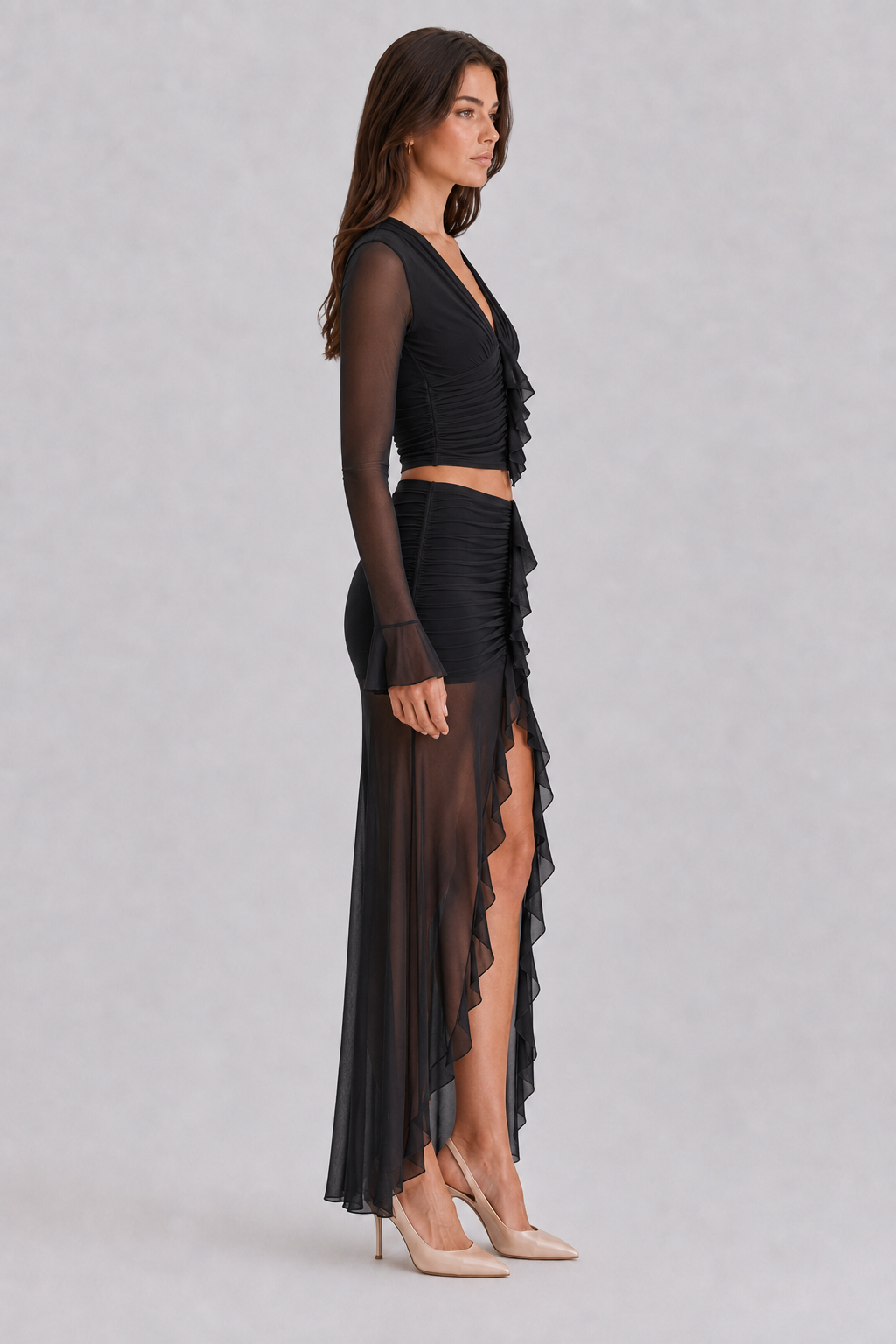 Black ruffle mesh crop top and high low maxi skirt side view