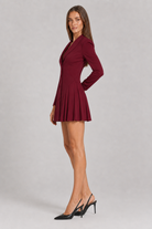 Burgundy pleated long sleeve blazer mini dress, side view
