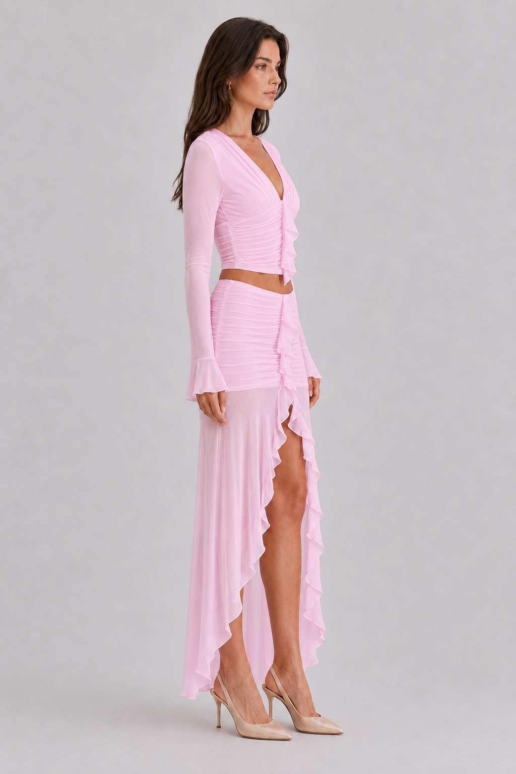 Pink ruffle mesh crop top and high low maxi skirt side view